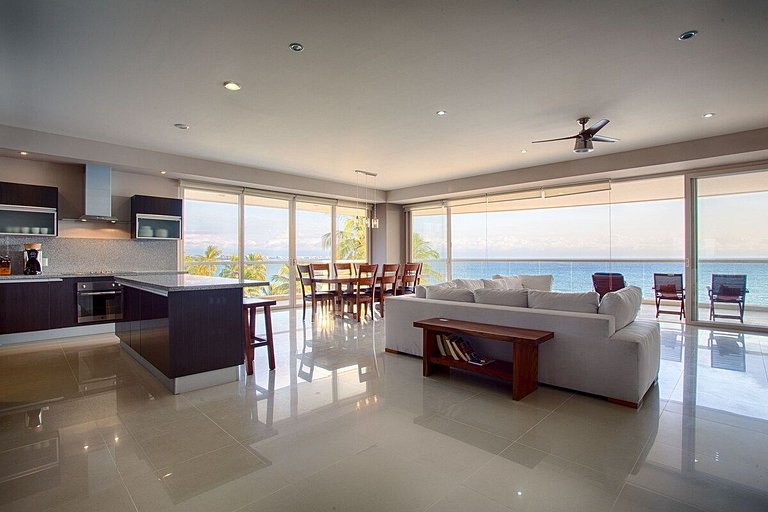 Beachfront Condo with Wrap-Around Terrace Views