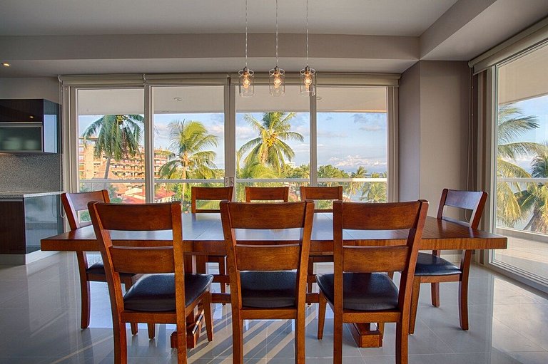 Beachfront Condo with Wrap-Around Terrace Views