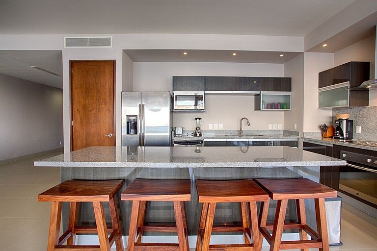 Beachfront Condo with Wrap-Around Terrace Views