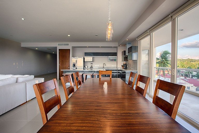 Beachfront Condo with Wrap-Around Terrace Views