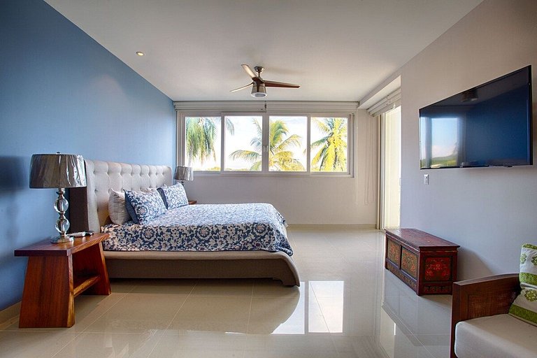 Beachfront Condo with Wrap-Around Terrace Views