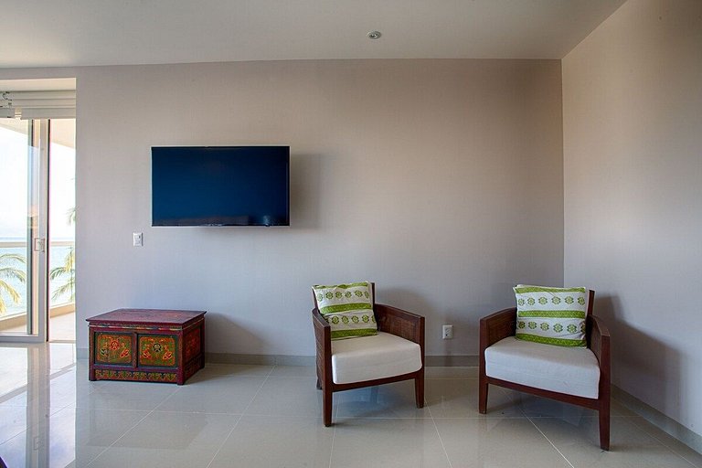 Beachfront Condo with Wrap-Around Terrace Views