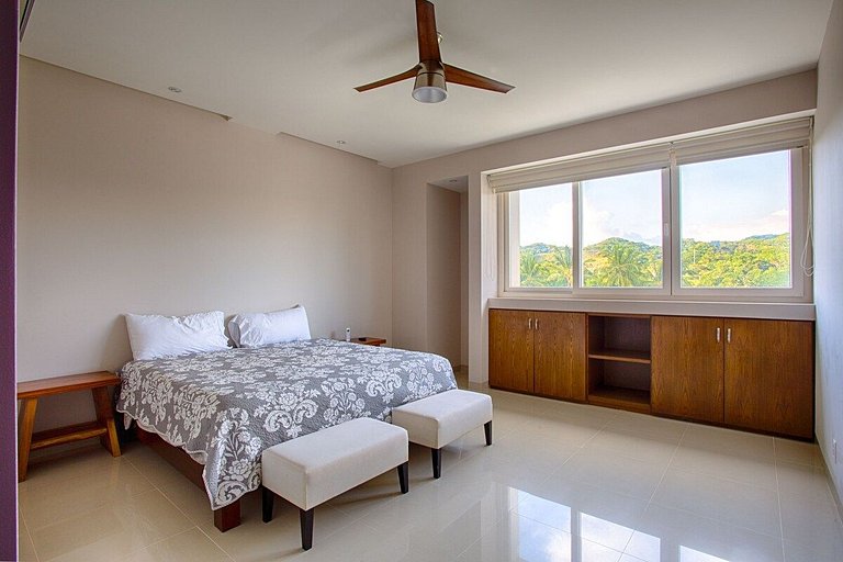Beachfront Condo with Wrap-Around Terrace Views