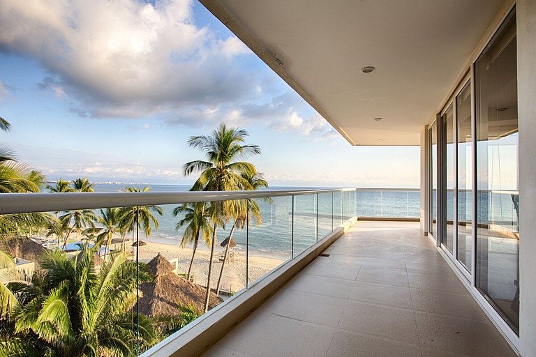 Beachfront Condo with Wrap-Around Terrace Views