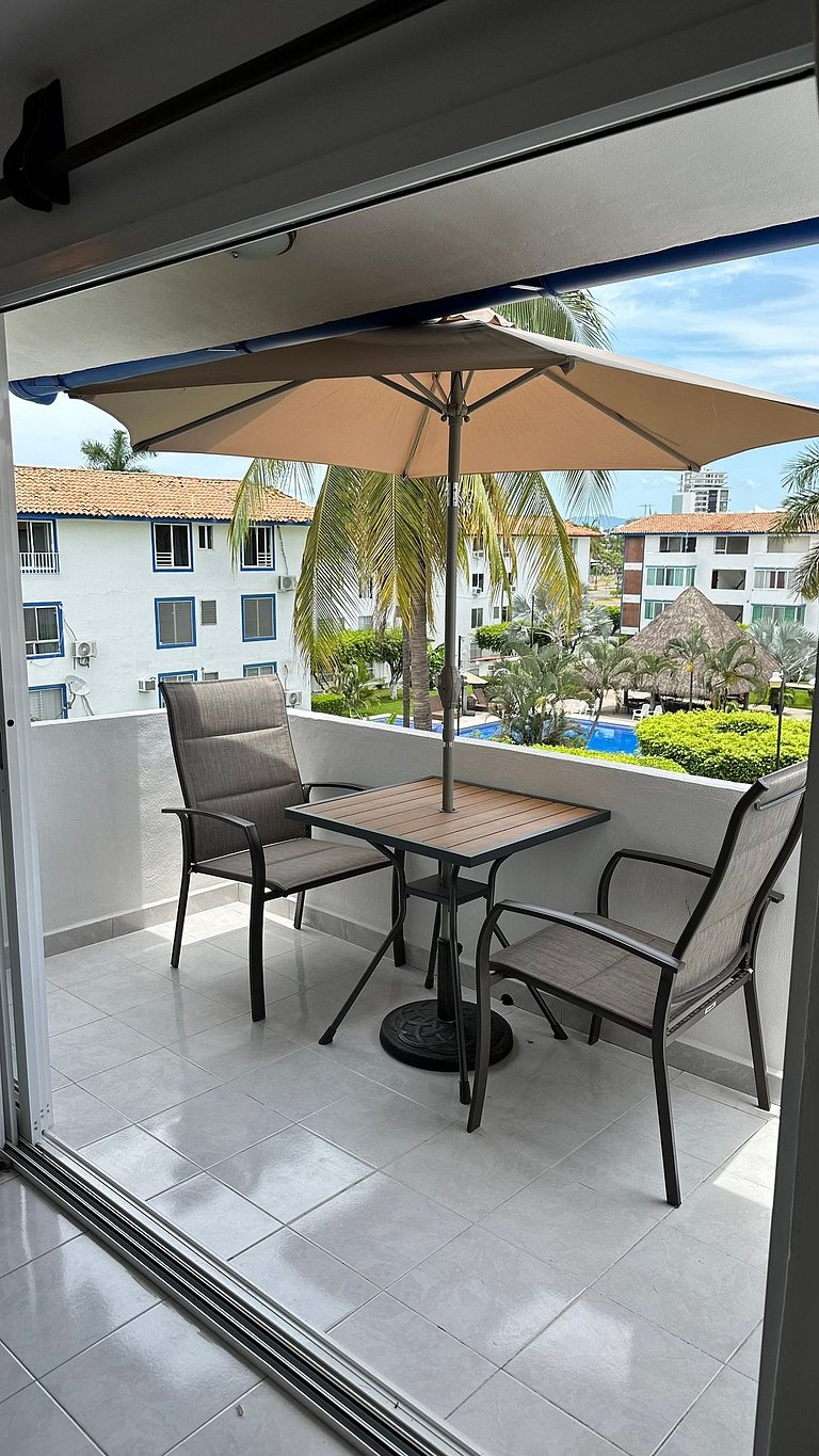 Palm-Shaded Pool Access, Near Beachfront Shops