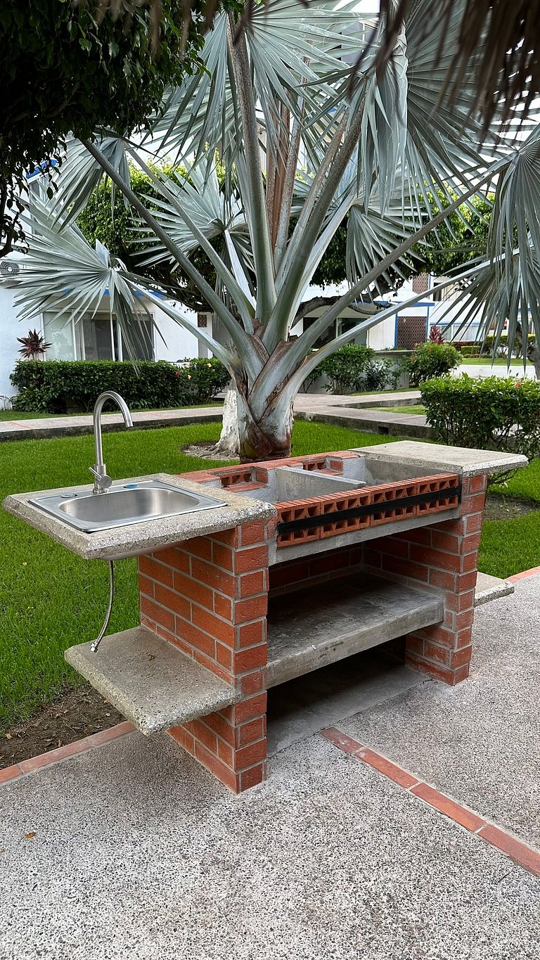 Palm-Shaded Pool Access, Near Beachfront Shops