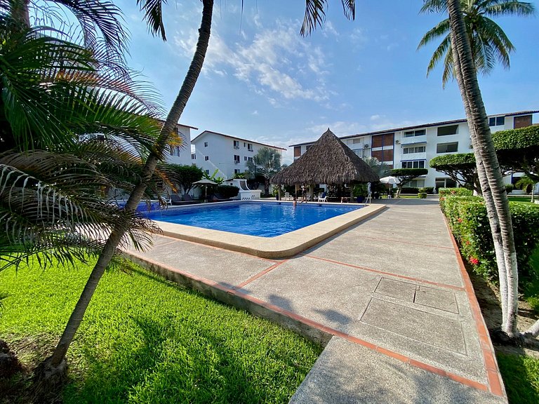 Poolside Condo with Balcony & BBQ · Hotel Zone