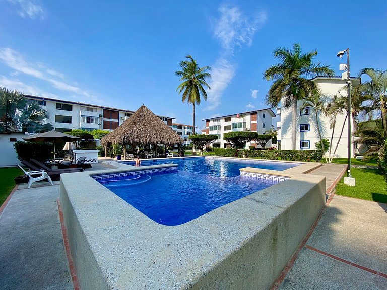 Palm-Shaded Pool Access, Near Beachfront Shops