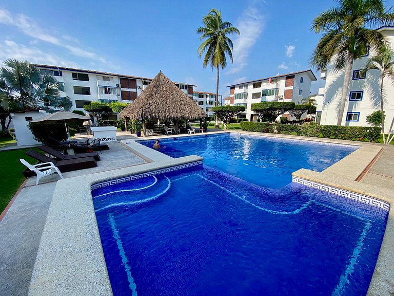 Palm-Shaded Pool Access, Near Beachfront Shops