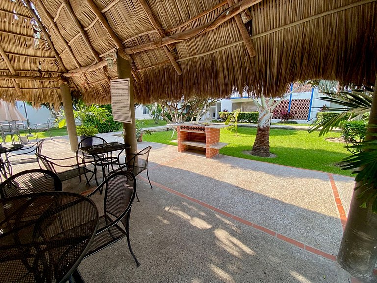 Palm-Shaded Pool Access, Near Beachfront Shops