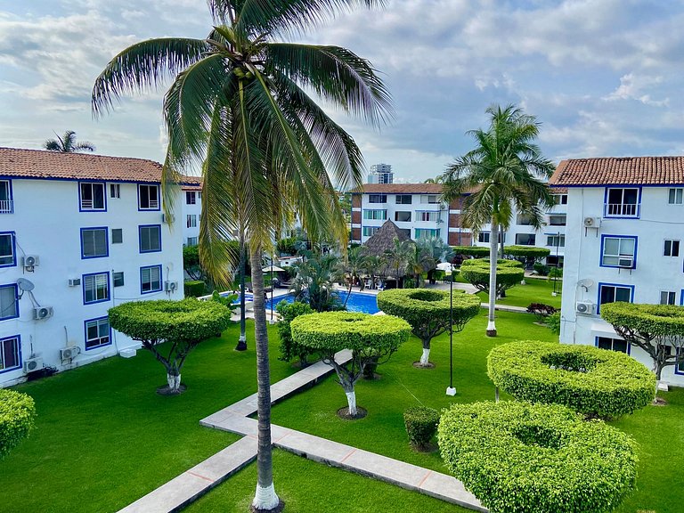 Palm-Shaded Pool Access, Near Beachfront Shops