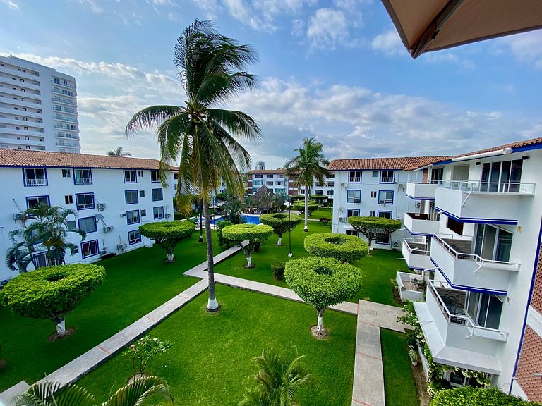 Palm-Shaded Pool Access, Near Beachfront Shops